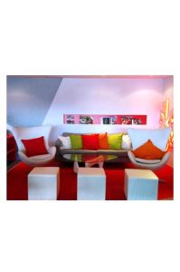 A living room with red and white Fluff Cushion furniture.