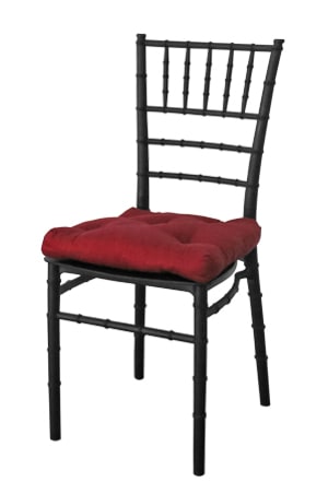 a black tiffany chair with red cushion