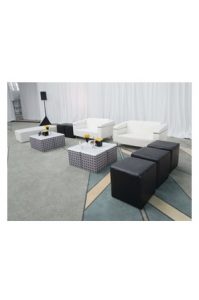 a living room set with white couches and black madison cube ottomans