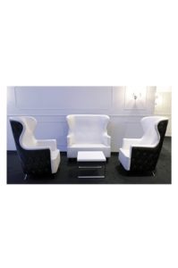 a white and black living room set with a silverback wing arm chair double seater