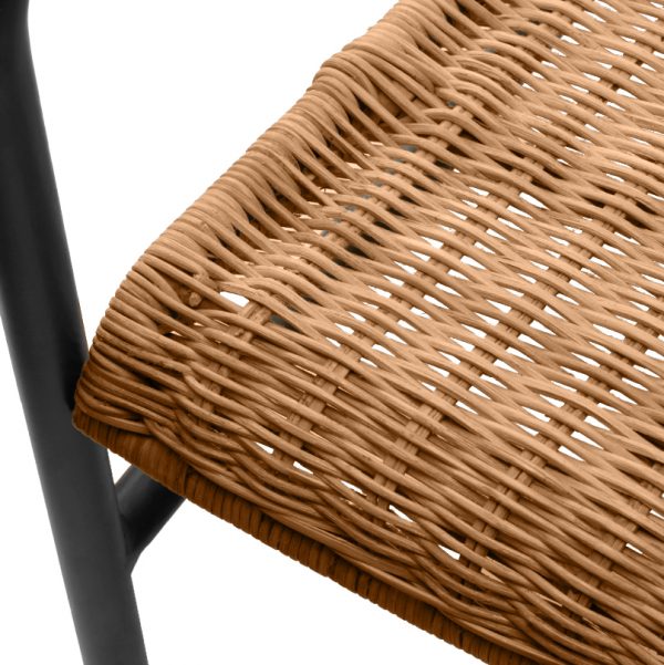 a close up of a cayman rattan armchair with a black frame