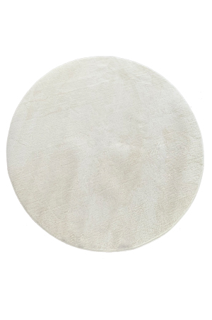 a rug round white rug on a white surface