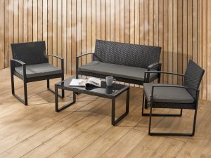 a black outback outdoor set on a wooden deck