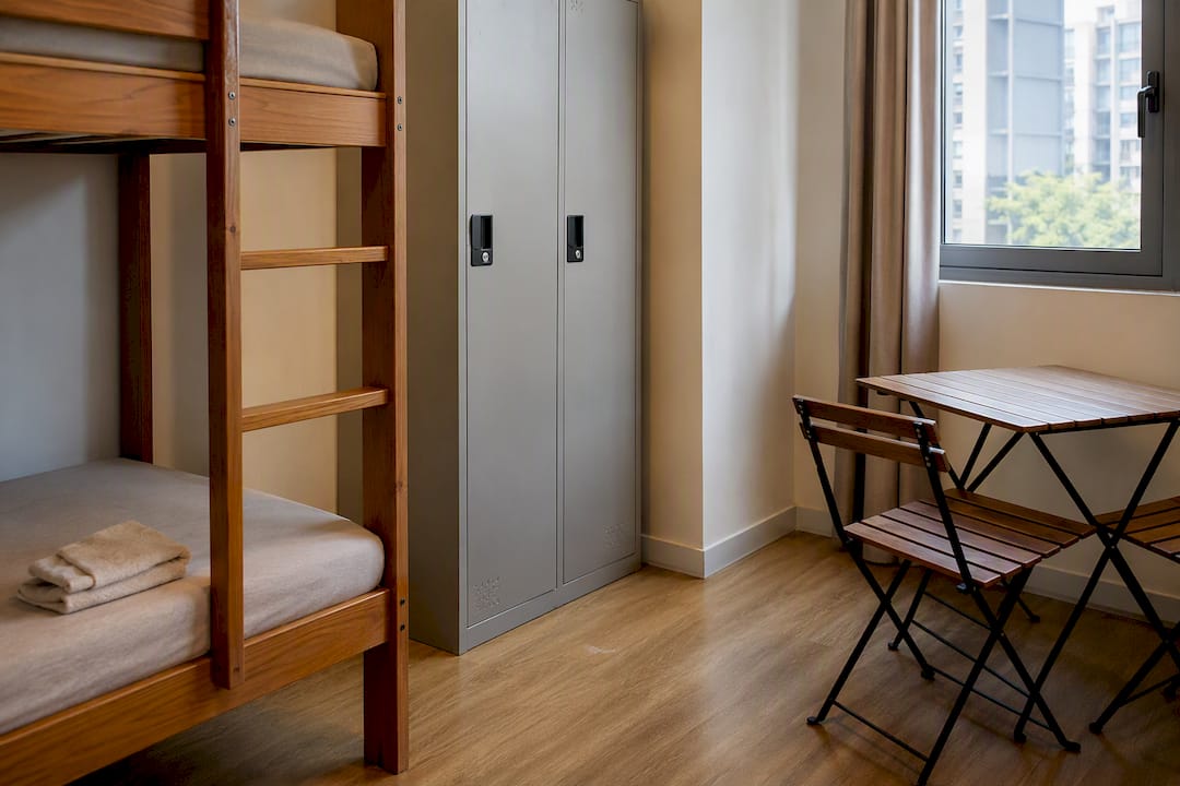 Singapore staff accommodation bedroom with bunk bed and locker