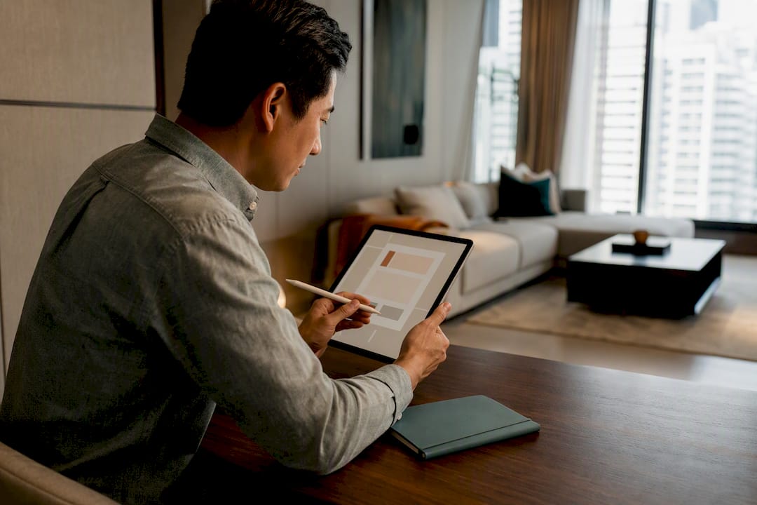 Coordinator reviewing rental quote in furnished condo